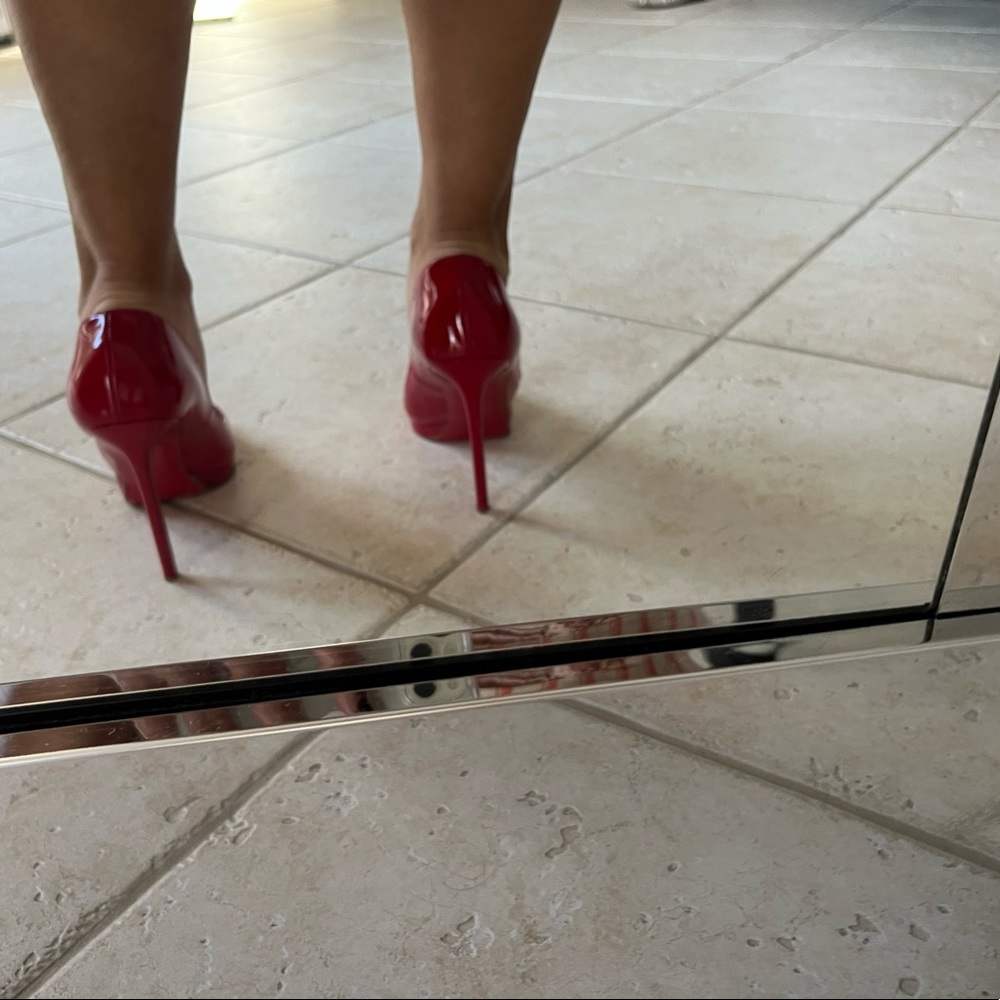 Christian Louboutin (authentic) red patent w platform heels.